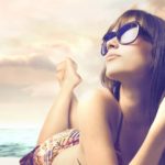 tapeciarnia.pl-179651_kobieta_plaza_morze_chmury